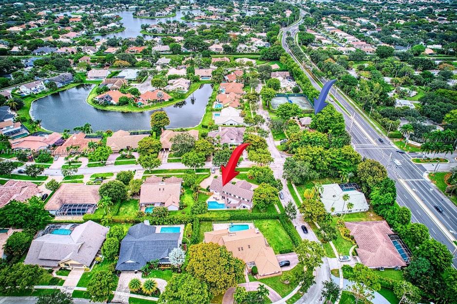 3010 Equestrian Drive Boca Raton, FL 33434 - Photo 53 of 53 an aerial view of residential house with outdoor space and swimming pool
