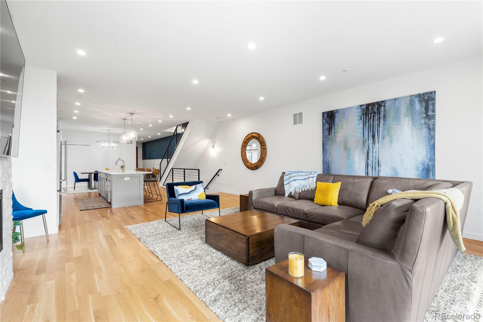 5327 Raleigh Street Denver, CO 80212 - Photo 14 of 40 a living room with furniture and a wooden floor