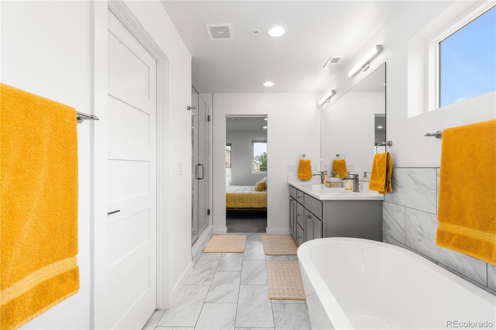 5327 Raleigh Street Denver, CO 80212 - Photo 24 of 40 a bathroom with a tub and a sink