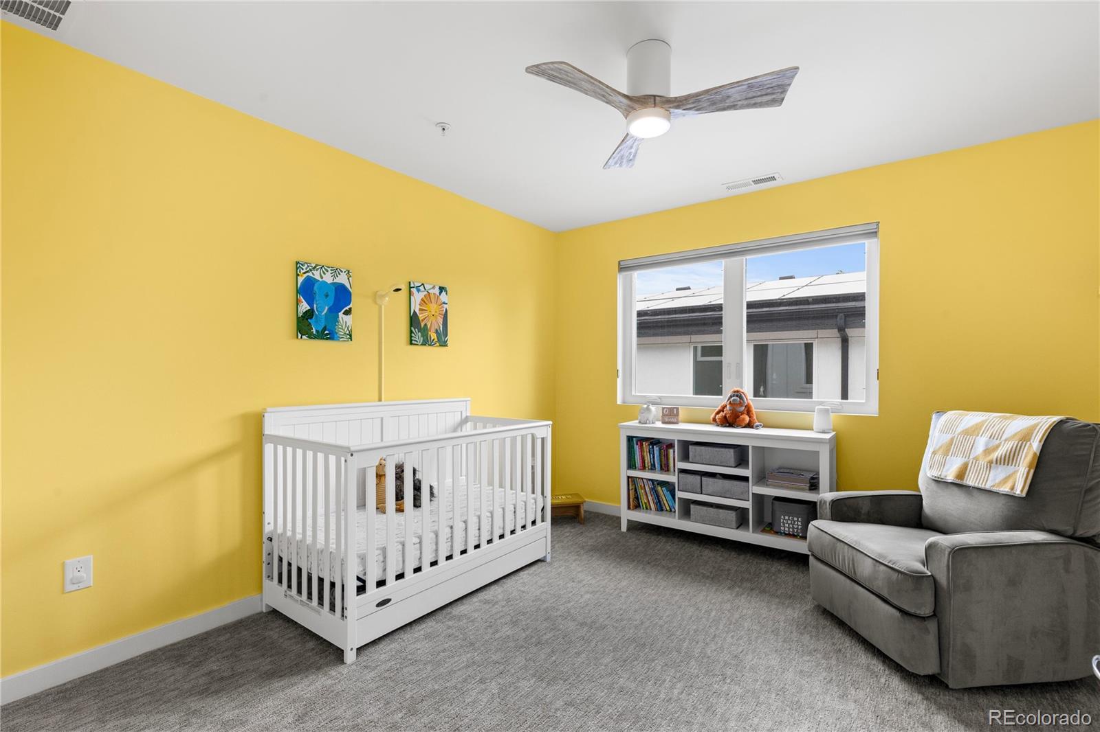 5327 Raleigh Street Denver, CO 80212 - Photo 27 of 40 a bed room with furniture and a window