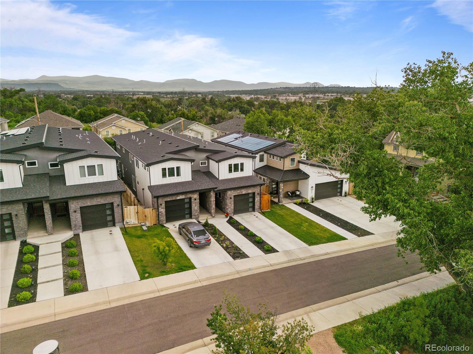 5327 Raleigh Street Denver, CO 80212 - Photo 40 of 40 an aerial view of residential houses with outdoor space and trees