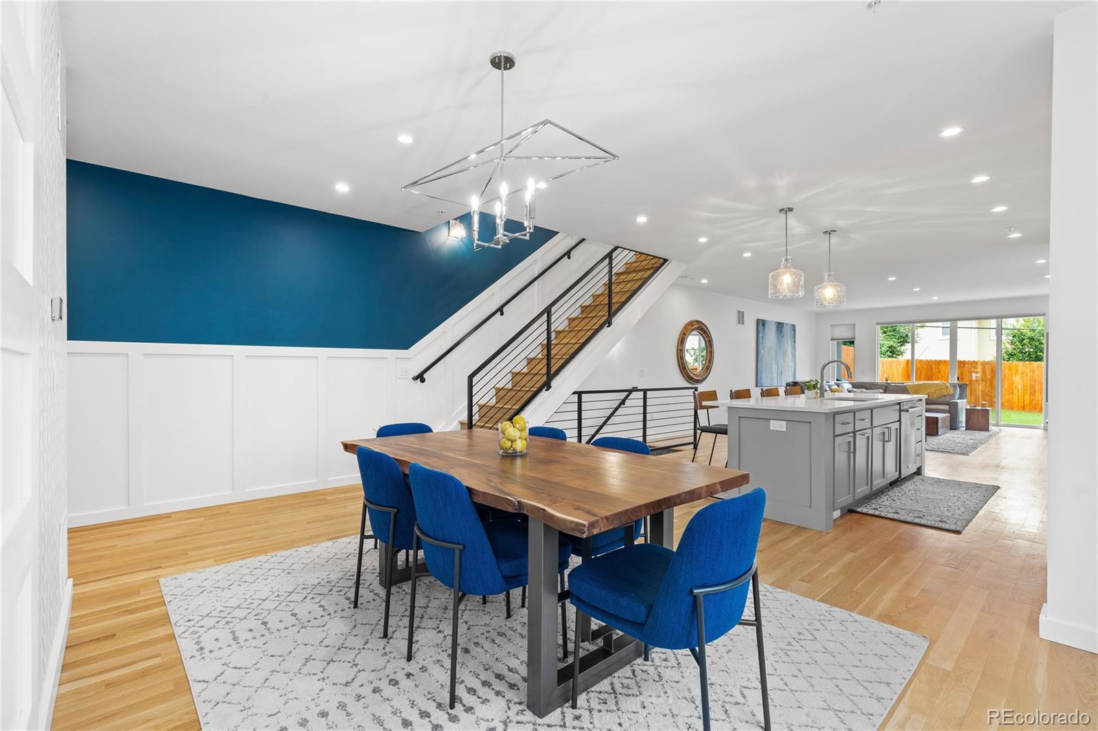 5327 Raleigh Street Denver, CO 80212 - Photo 6 of 40 a view of a dining room with furniture and a chandelier