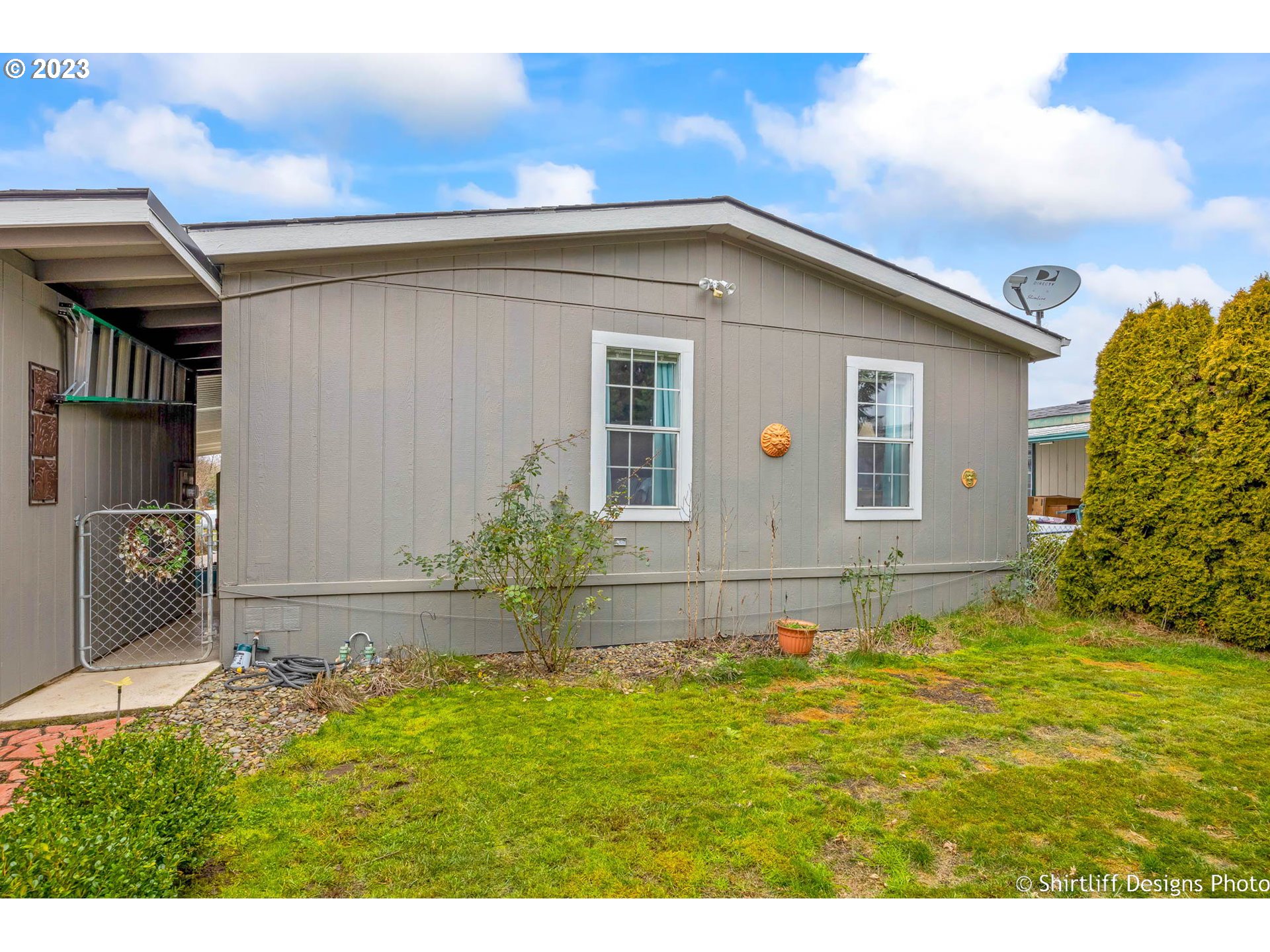 1699 North Terry Street, Unit 164 Eugene, OR 97402 - Photo 28 of 31 a house view with swimming pool in front of it