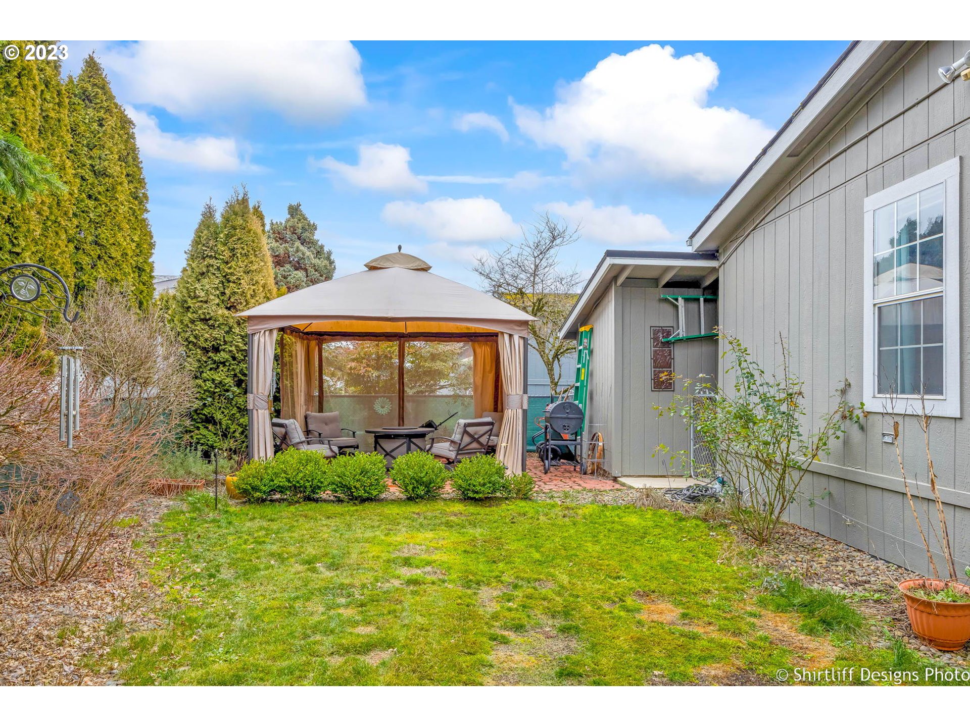 1699 North Terry Street, Unit 164 Eugene, OR 97402 - Photo 30 of 31 a view of a front of a house with a yard
