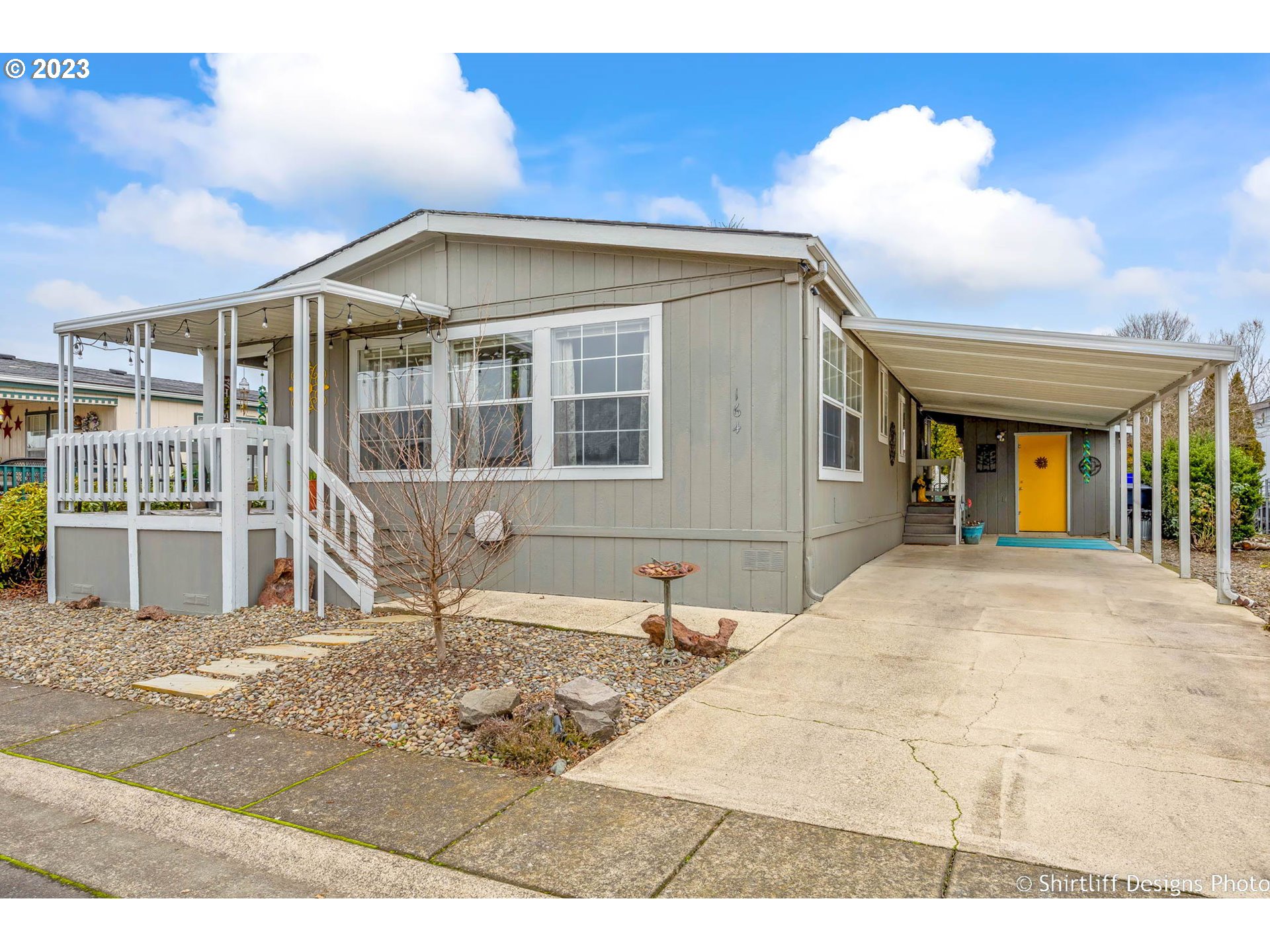 1699 North Terry Street, Unit 164 Eugene, OR 97402 - Photo 3 of 31 a view of a house with a outdoor space