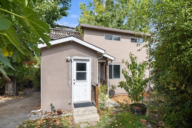 a front view of a house with an outdoor space
