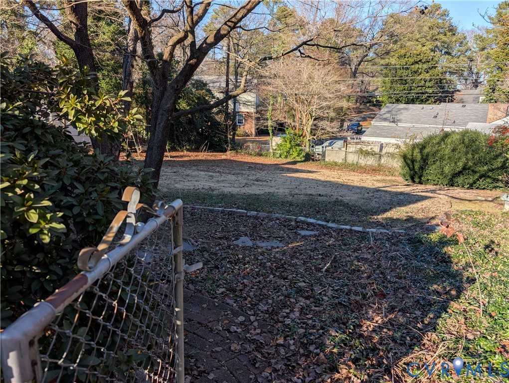 8216 Ireton Road Henrico, VA 23228 - Photo 5 of 16 a backyard of a house with lots of green space