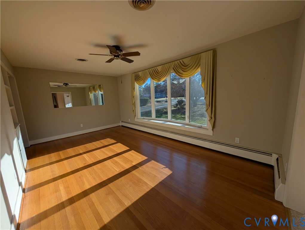 8216 Ireton Road Henrico, VA 23228 - Photo 6 of 16 a view of an empty room with a window