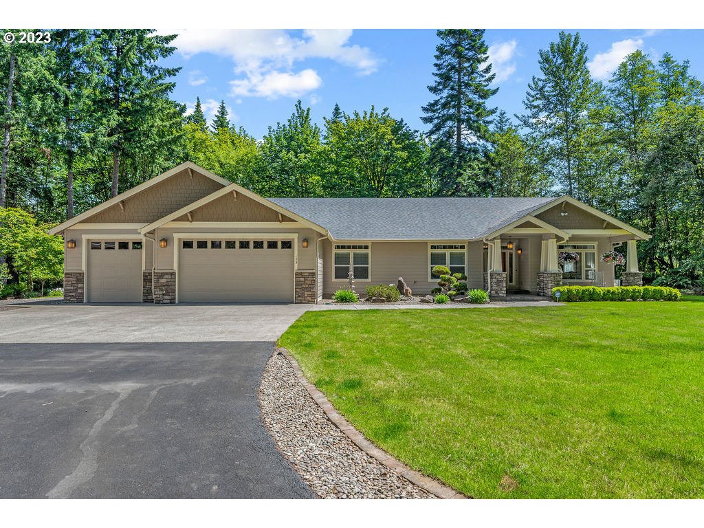 153 Cornell Road Toutle, WA 98649 - Photo 2 of 35 a front view of a house with a yard