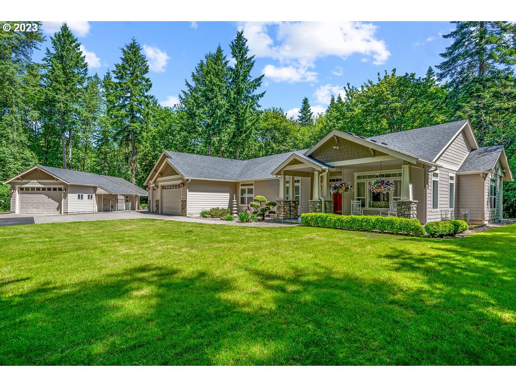 153 Cornell Road Toutle, WA 98649 - Photo 4 of 35 a front view of a house with a garden