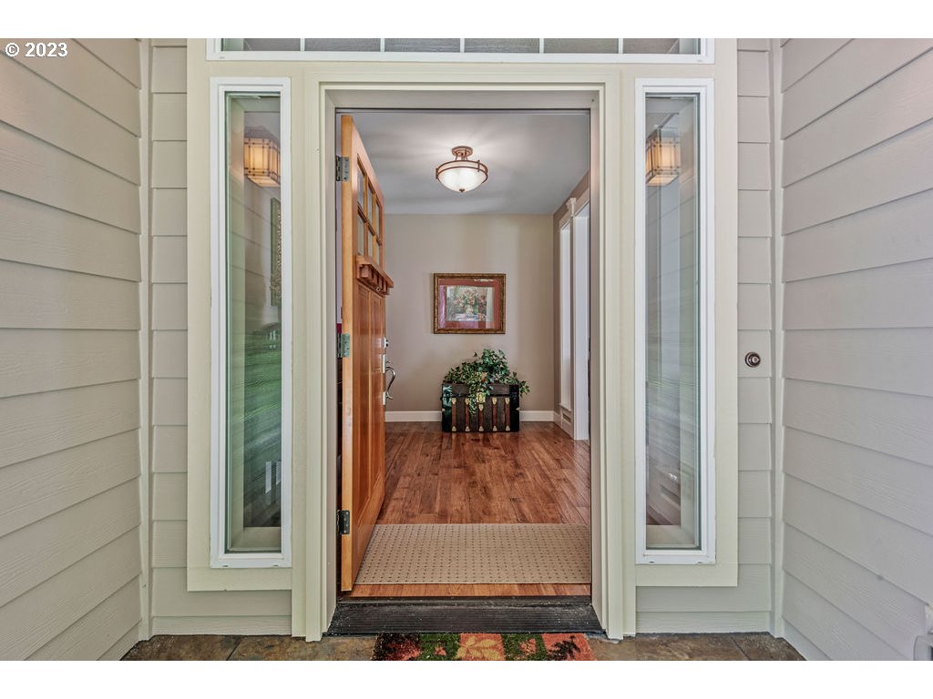 153 Cornell Road Toutle, WA 98649 - Photo 6 of 35 a view of a hallway with a room and dining room view