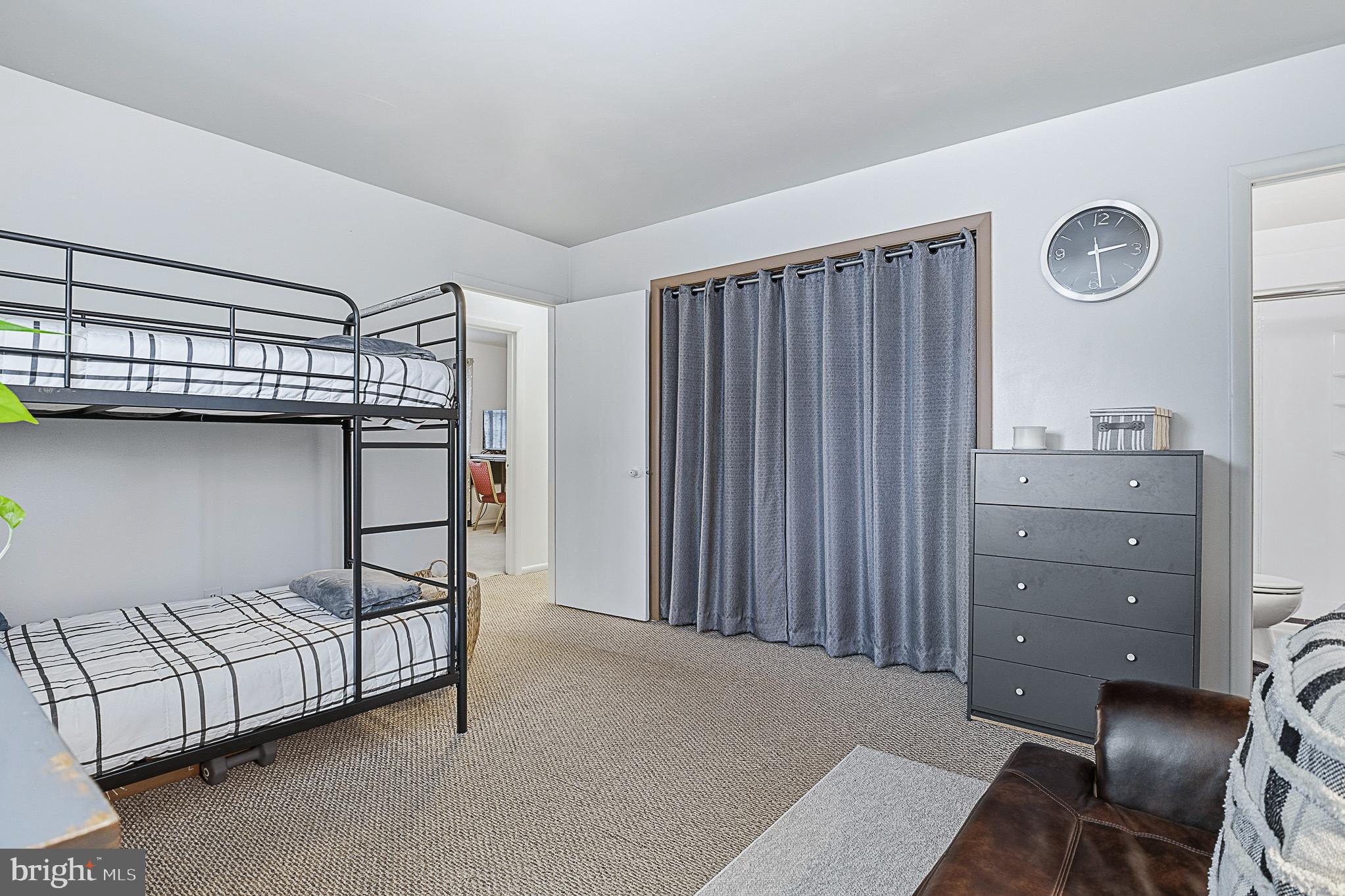 4542 Kinmount Road Lanham, MD 20706 - Photo 37 of 70 a bedroom with a bed and a window