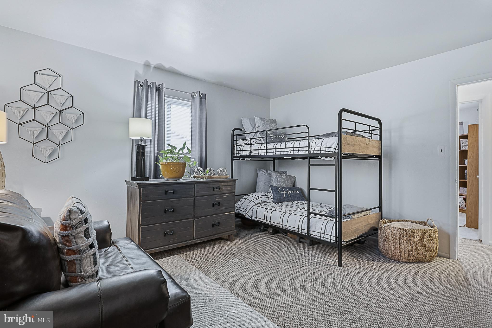 4542 Kinmount Road Lanham, MD 20706 - Photo 41 of 70 a bedroom with a bed and a window