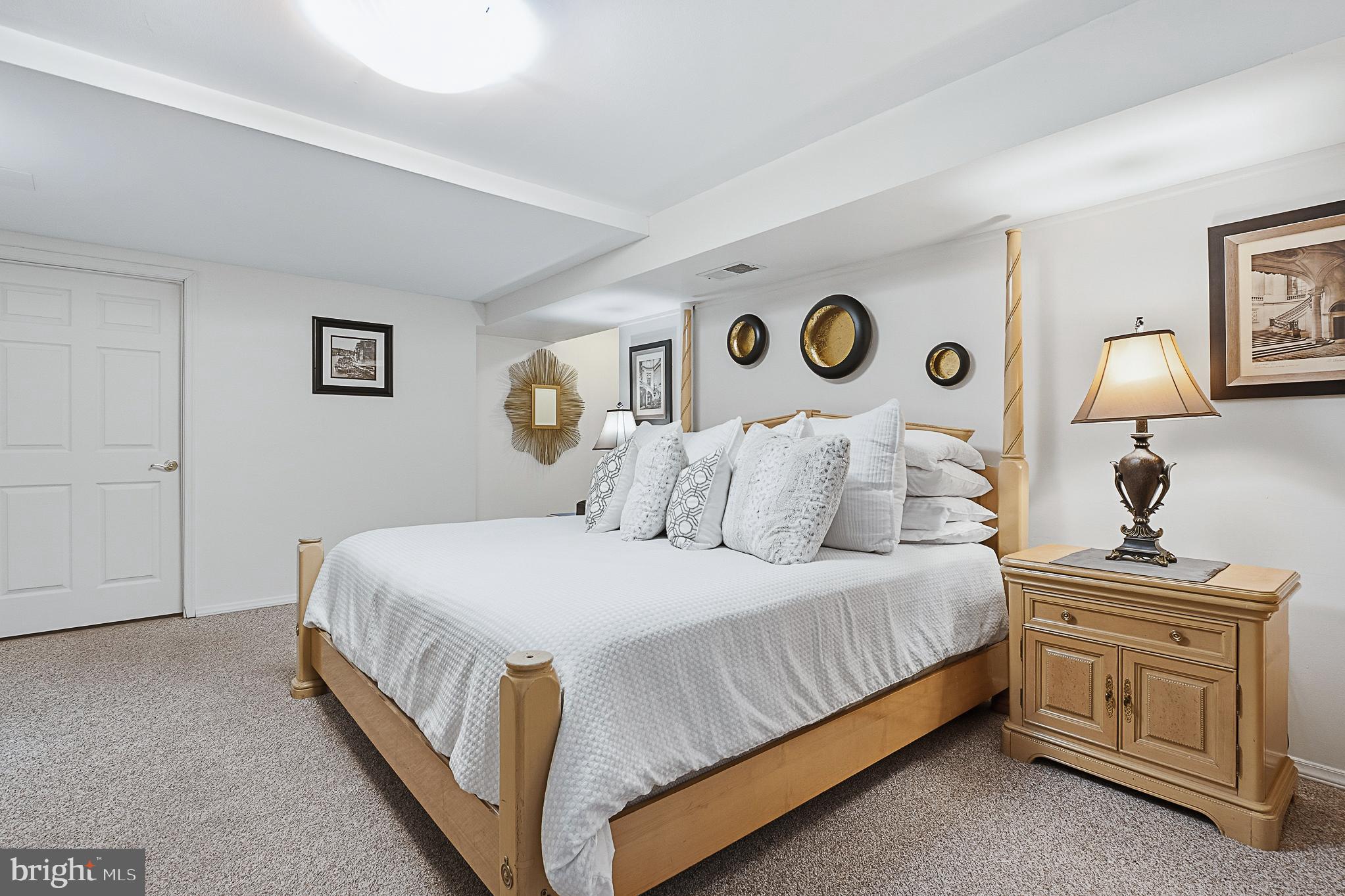 4542 Kinmount Road Lanham, MD 20706 - Photo 56 of 70 a bedroom with a bed and a window