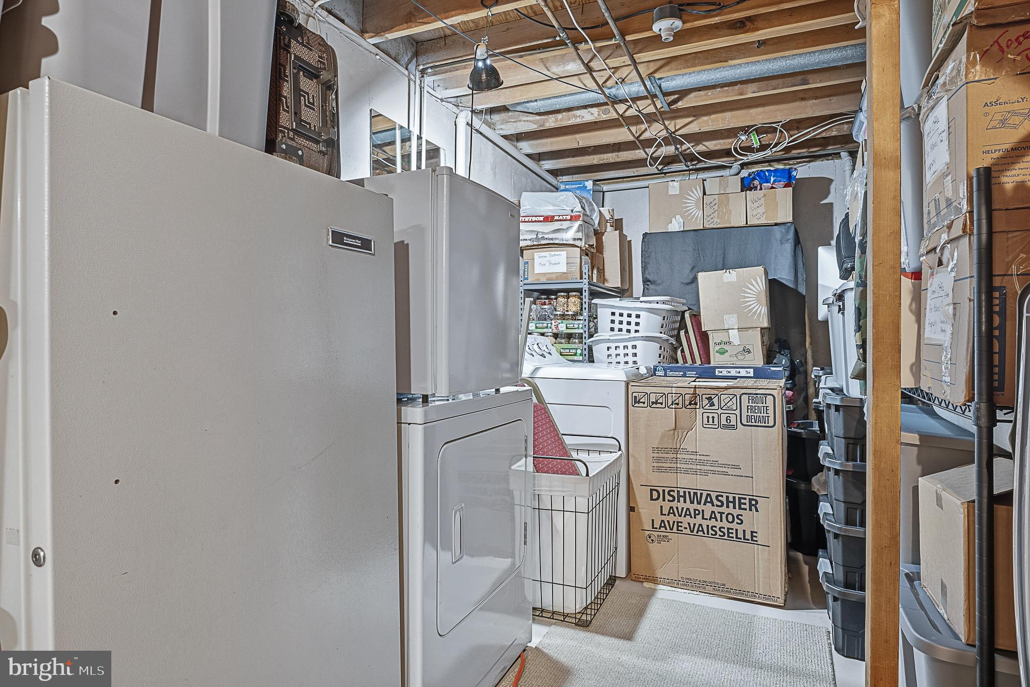 4542 Kinmount Road Lanham, MD 20706 - Photo 60 of 70 a storage room with washer and dryer