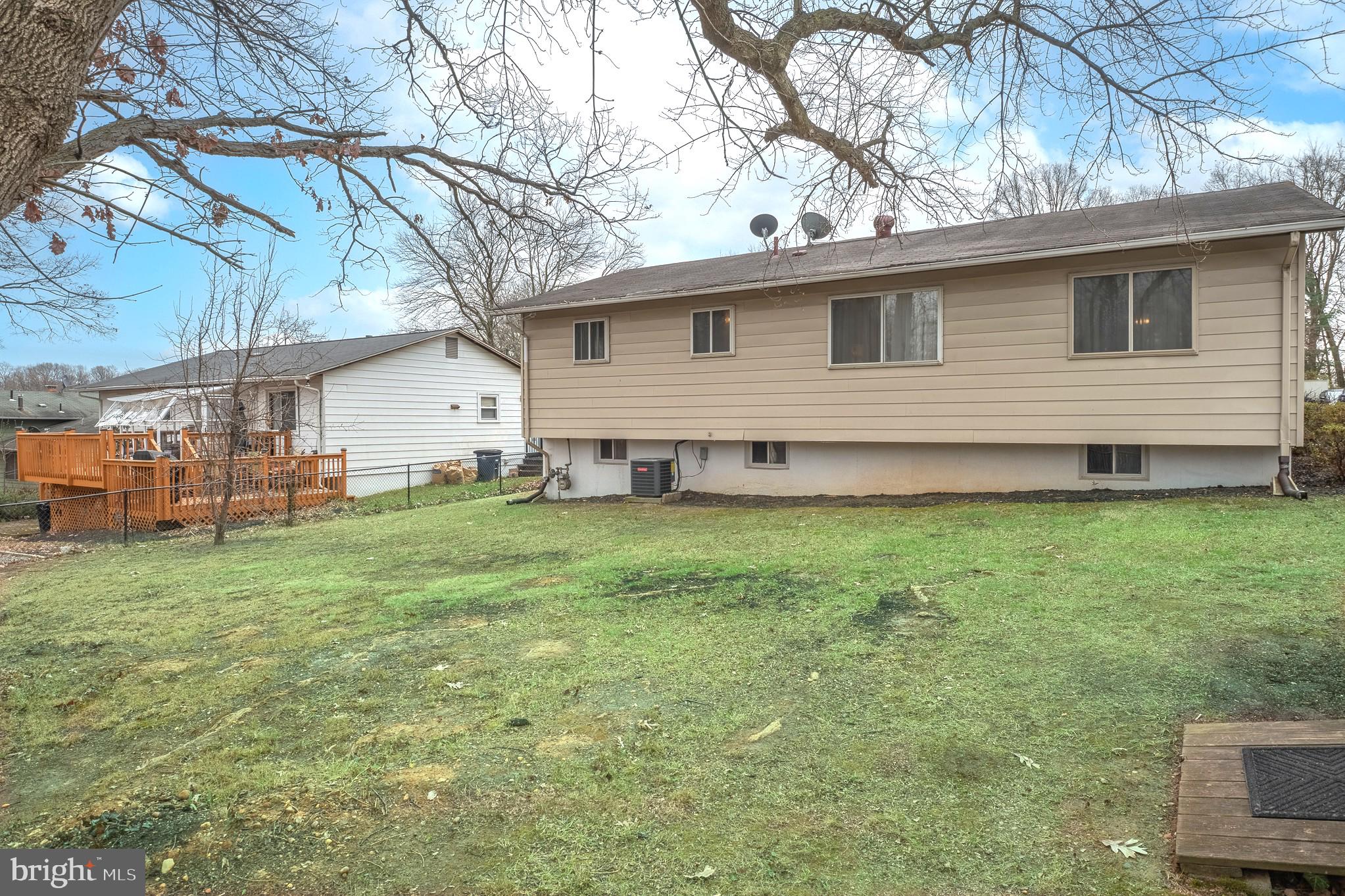 4542 Kinmount Road Lanham, MD 20706 - Photo 64 of 70 a view of a house with a backyard