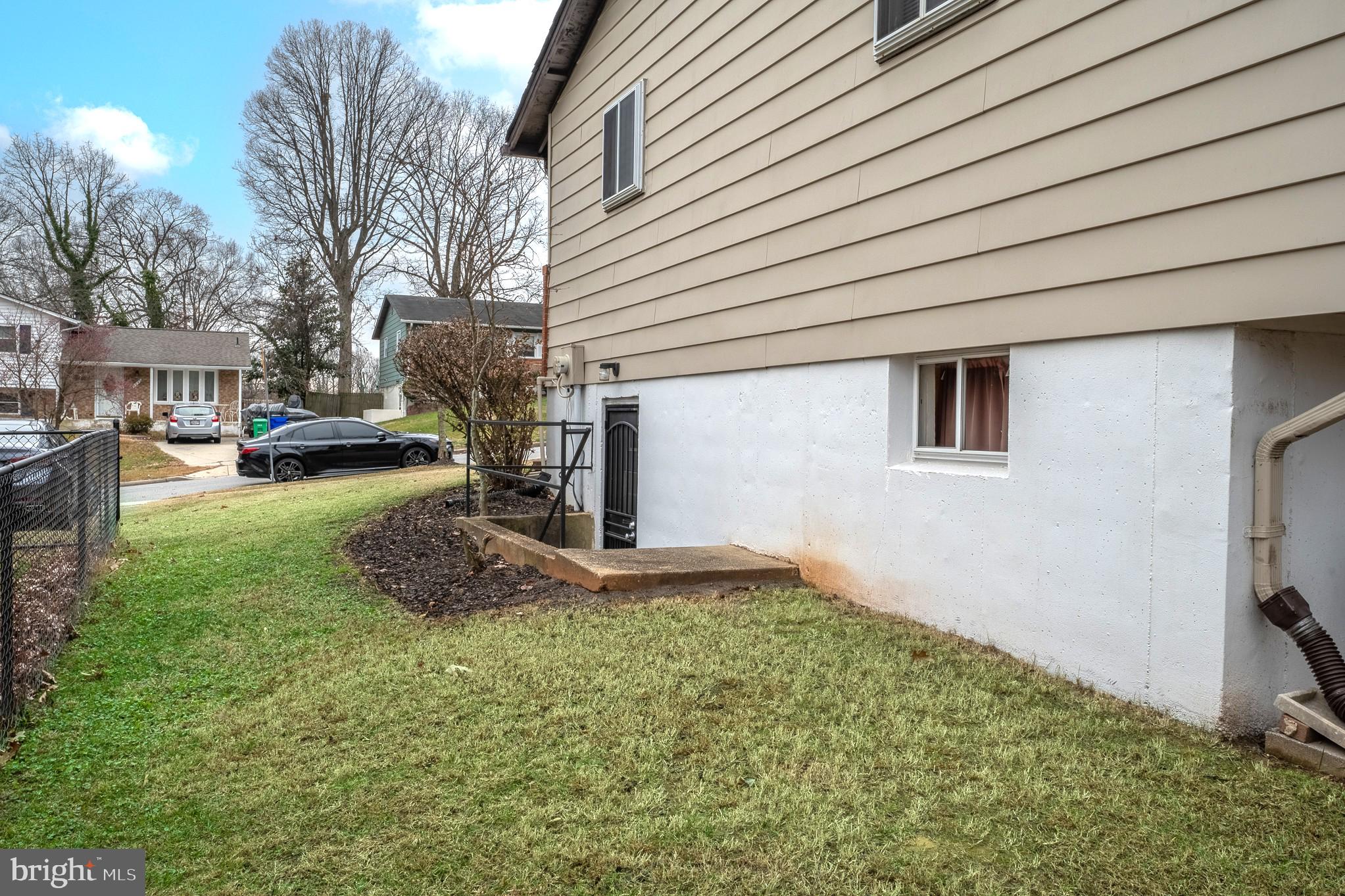 4542 Kinmount Road Lanham, MD 20706 - Photo 66 of 70 a view of a backyard with plants and large tree