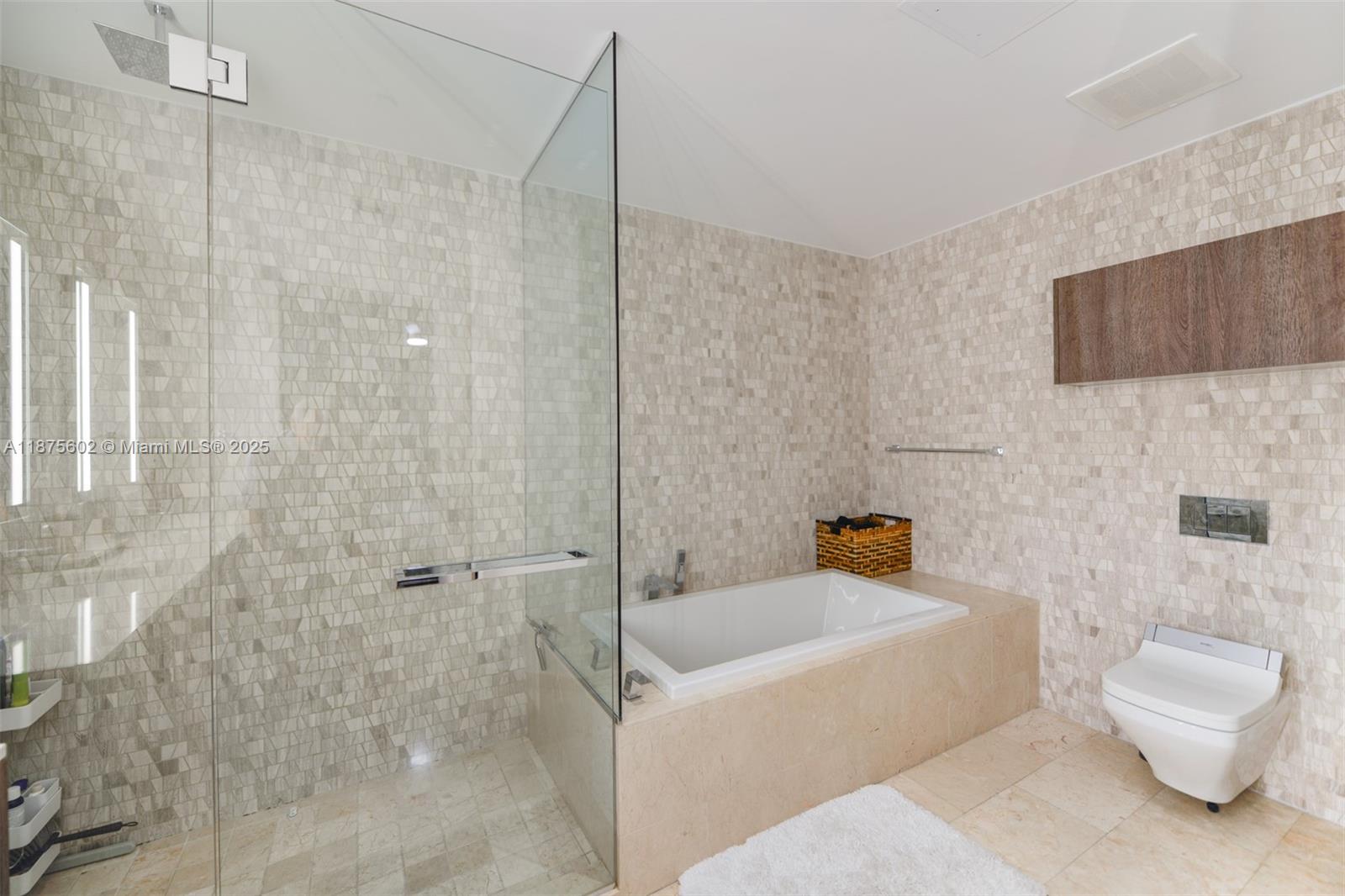 88 Southwest 7th Street, Unit 2204 Miami, FL 33130 - Photo 22 of 58 a bathroom with a sink a toilet and shower