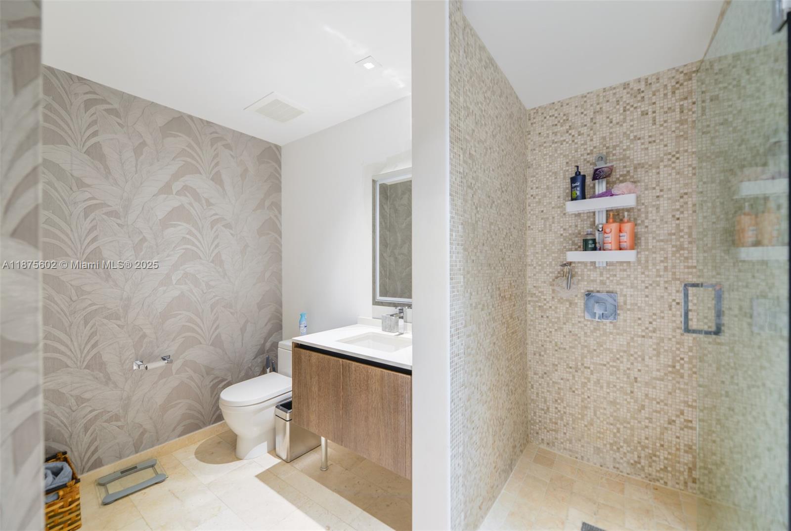 88 Southwest 7th Street, Unit 2204 Miami, FL 33130 - Photo 26 of 58 a bathroom with a toilet sink and shower