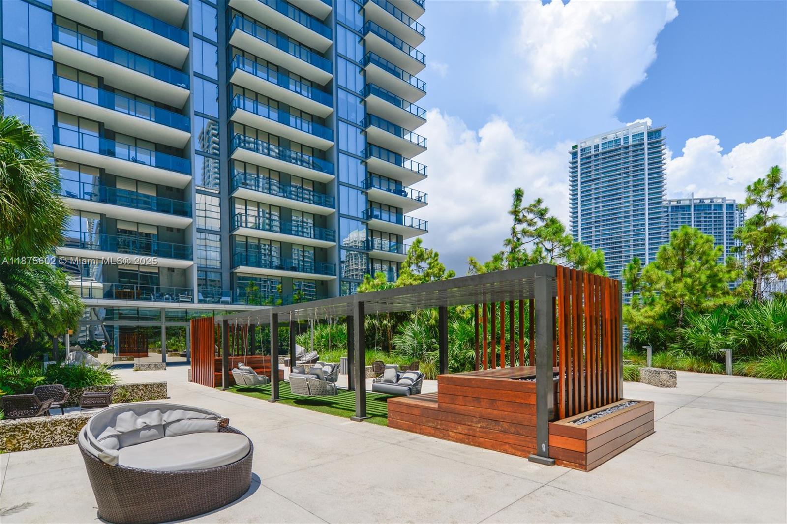 88 Southwest 7th Street, Unit 2204 Miami, FL 33130 - Photo 35 of 58 a view of a building with garden and plants