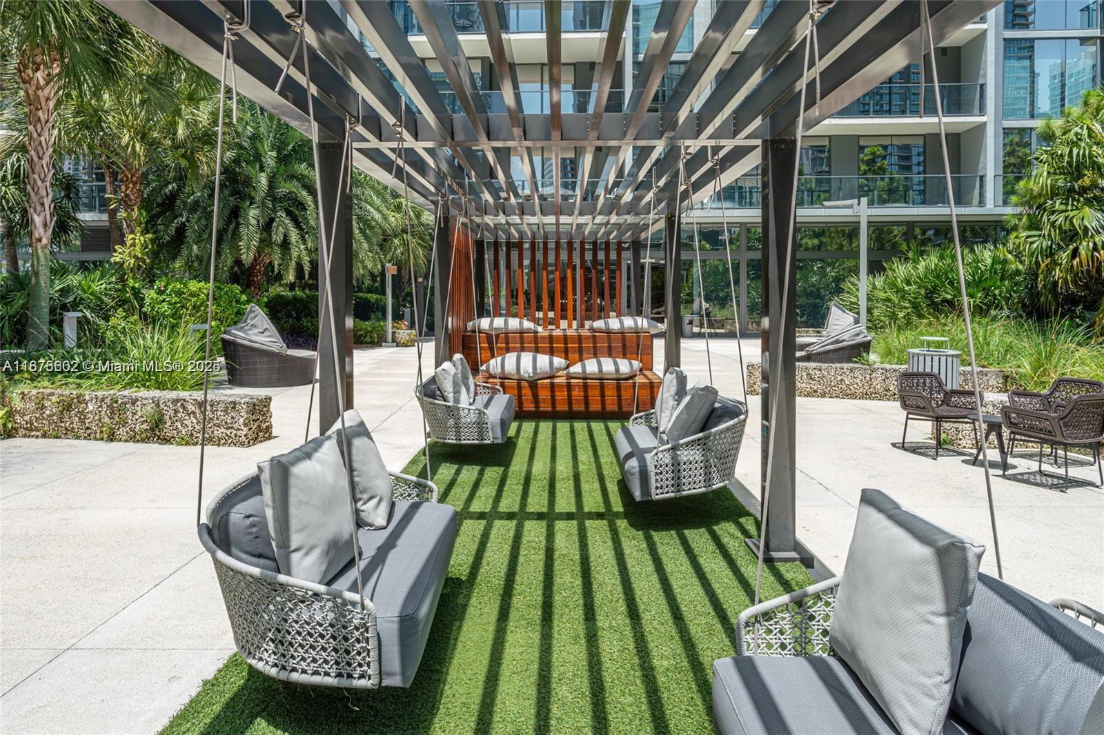 88 Southwest 7th Street, Unit 2204 Miami, FL 33130 - Photo 56 of 58 a view of outdoor space yard deck patio and outdoor kitchen