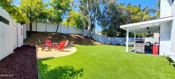 a view of a tables and chairs in the patio