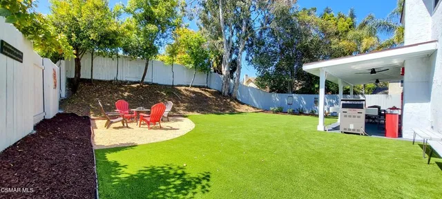 a view of a tables and chairs in the patio