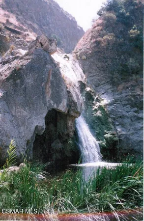 a view of outdoor space and mountain view in back