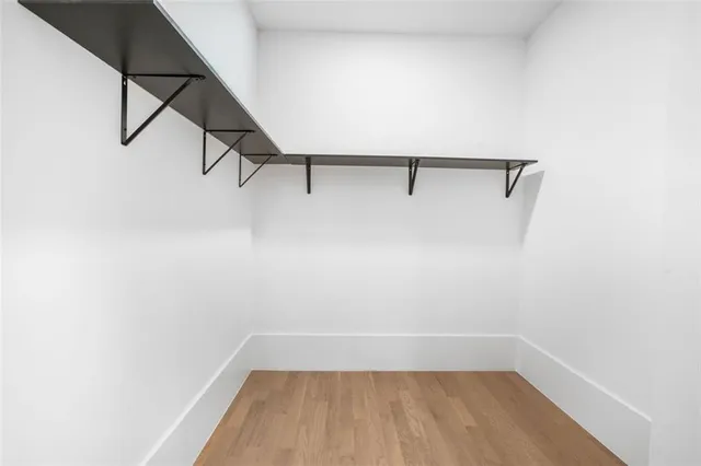 a bathroom with a shower and a toilet