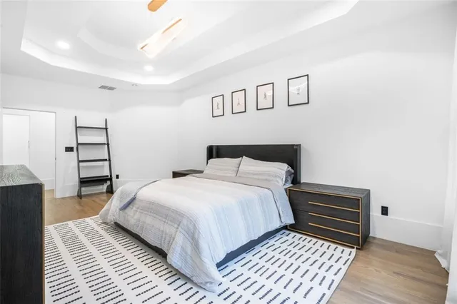 a bathroom with a sink a vanity and shower