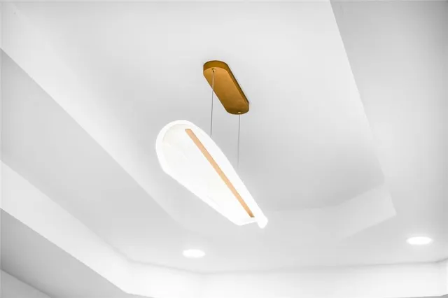 a bathroom with a shower sink and mirror