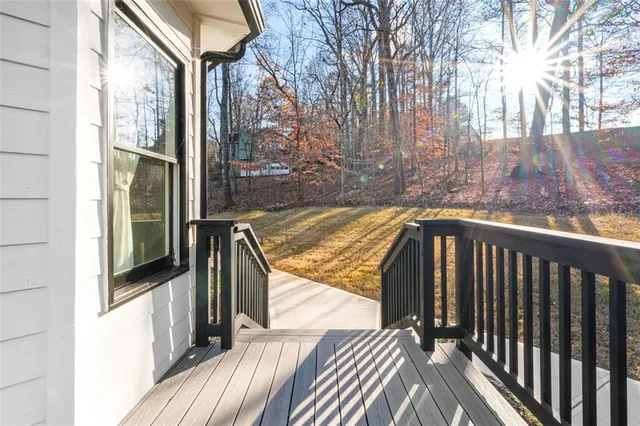 a bedroom with a large bed and a couch