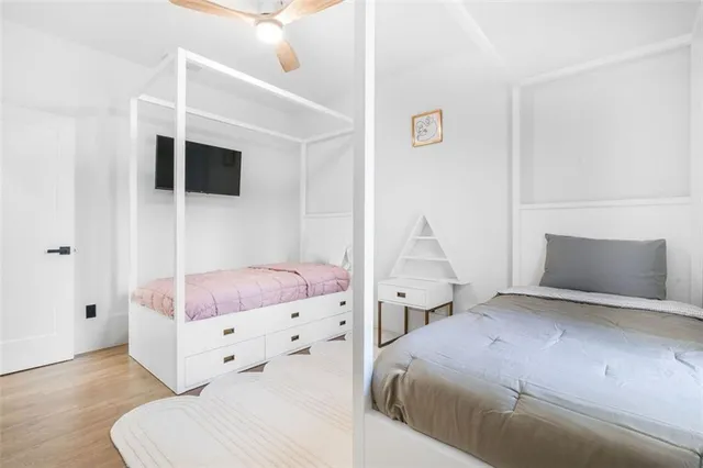 a kitchen with a sink cabinets and refrigerator
