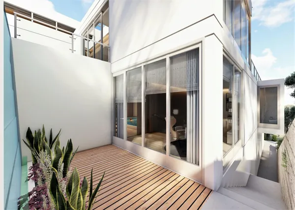 a view of a couches on the roof deck