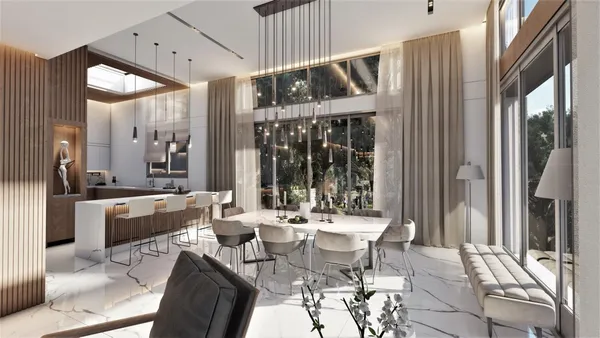 a large kitchen with a table and chairs