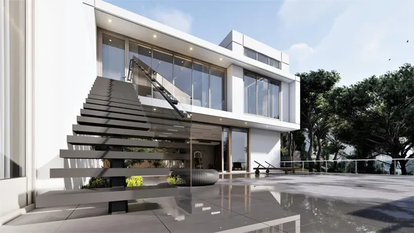 a terrace with outdoor seating and trees