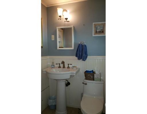 12 Parlee Road Chelmsford, MA 01824 - Photo 14 of 31 a bathroom with a toilet sink and mirror