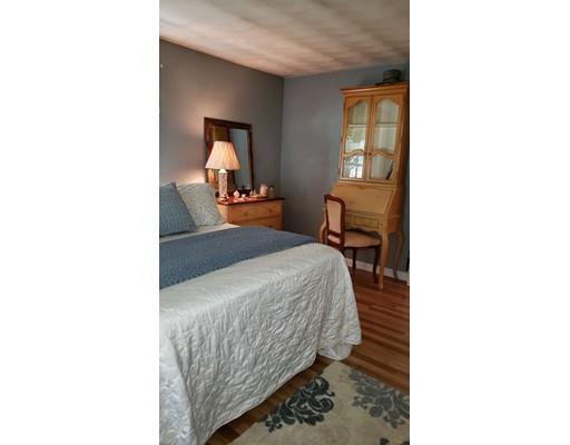 12 Parlee Road Chelmsford, MA 01824 - Photo 15 of 31 a bedroom with a bed and a mirror