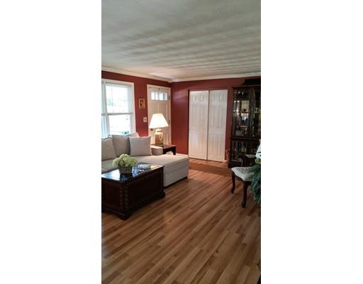 12 Parlee Road Chelmsford, MA 01824 - Photo 2 of 31 a living room with furniture and a large window
