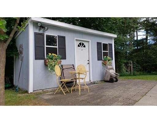 12 Parlee Road Chelmsford, MA 01824 - Photo 28 of 31 a backyard of a house with table and chairs