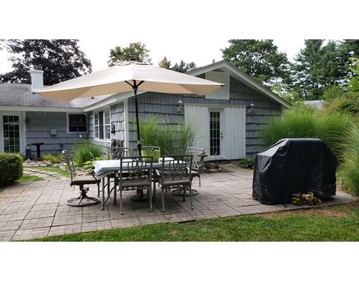 12 Parlee Road Chelmsford, MA 01824 - Photo 30 of 31 a backyard of a house with yard fire pit table and chairs