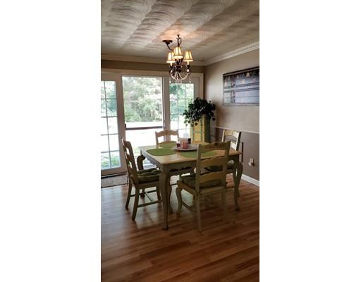12 Parlee Road Chelmsford, MA 01824 - Photo 9 of 31 a dining room with furniture and window