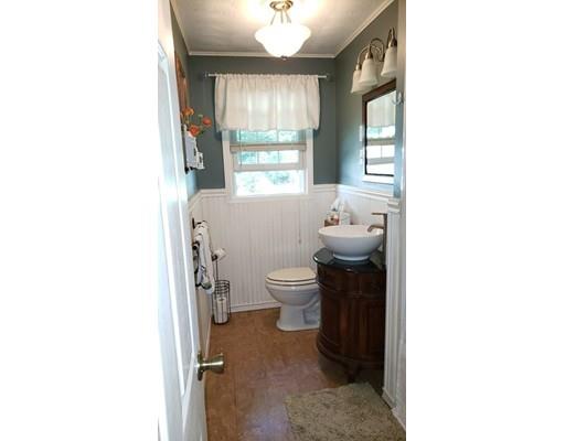 12 Parlee Road Chelmsford, MA 01824 - Photo 10 of 31 a bathroom with a toilet sink and mirror