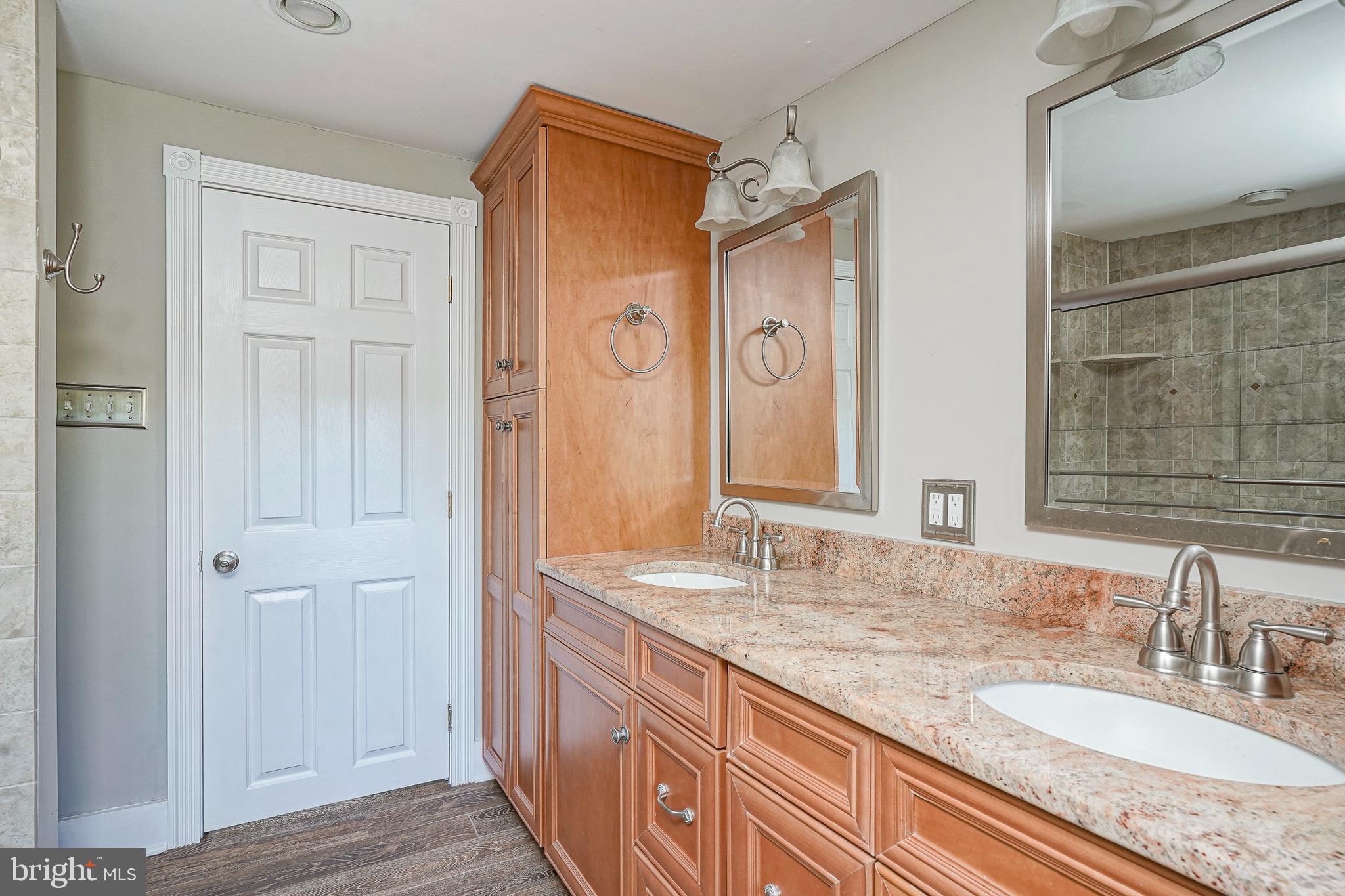 53 Branch Street Medford, NJ 08055 - Photo 28 of 41 a bathroom with a granite countertop double vanity sink mirror and