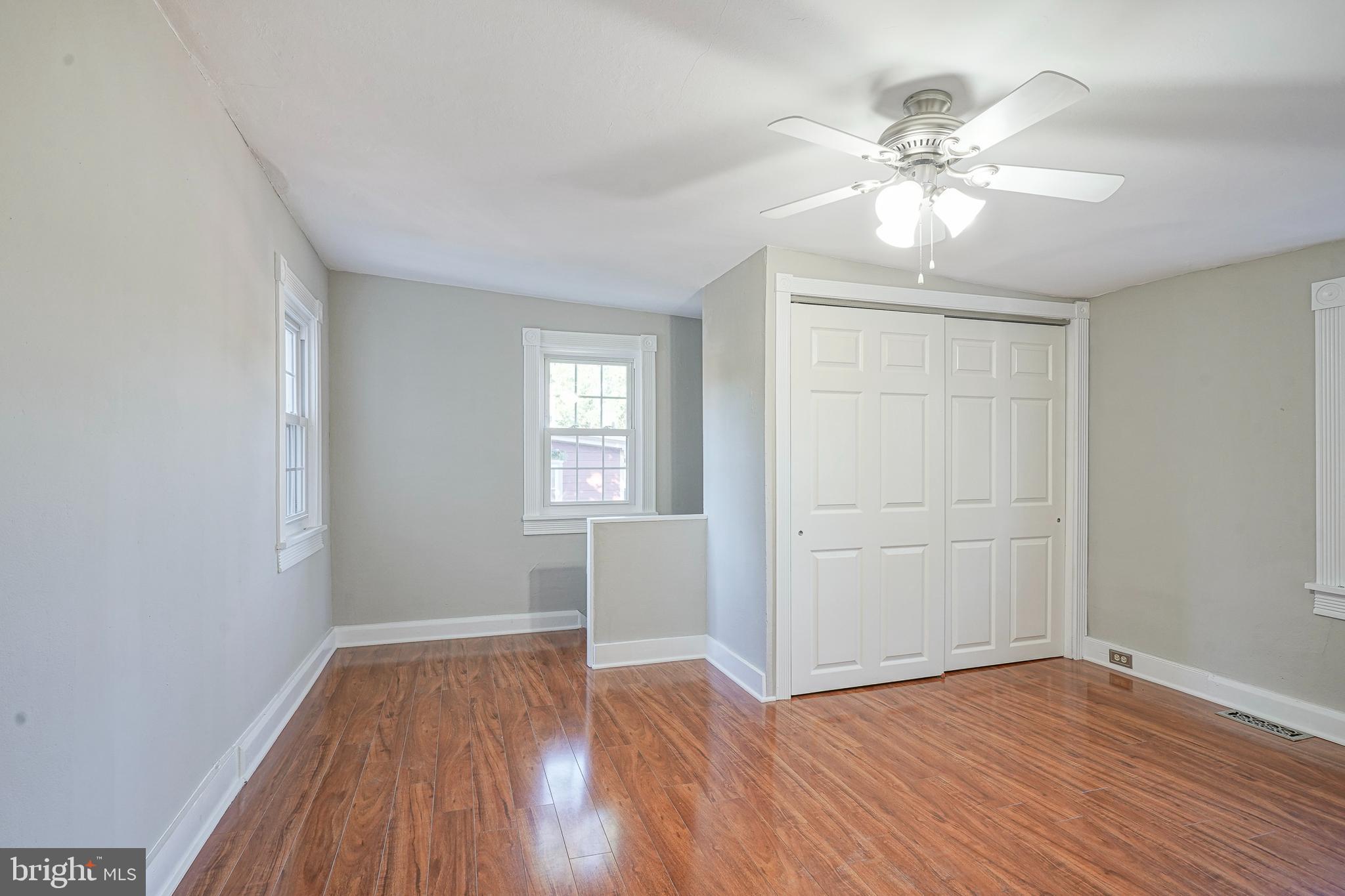53 Branch Street Medford, NJ 08055 - Photo 29 of 41 wooden floor in an empty room with a window