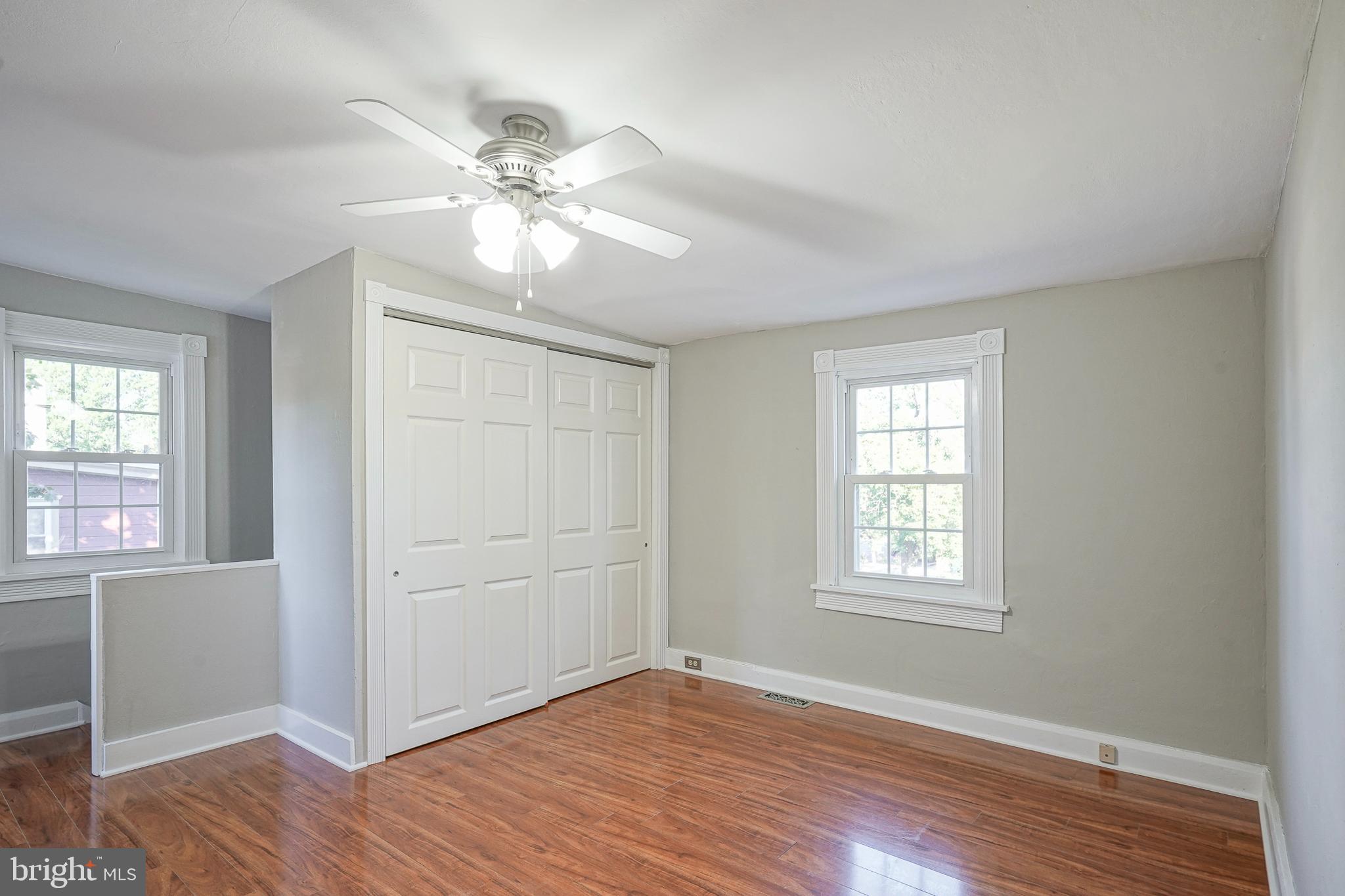 53 Branch Street Medford, NJ 08055 - Photo 30 of 41 wooden floor in an empty room with a window