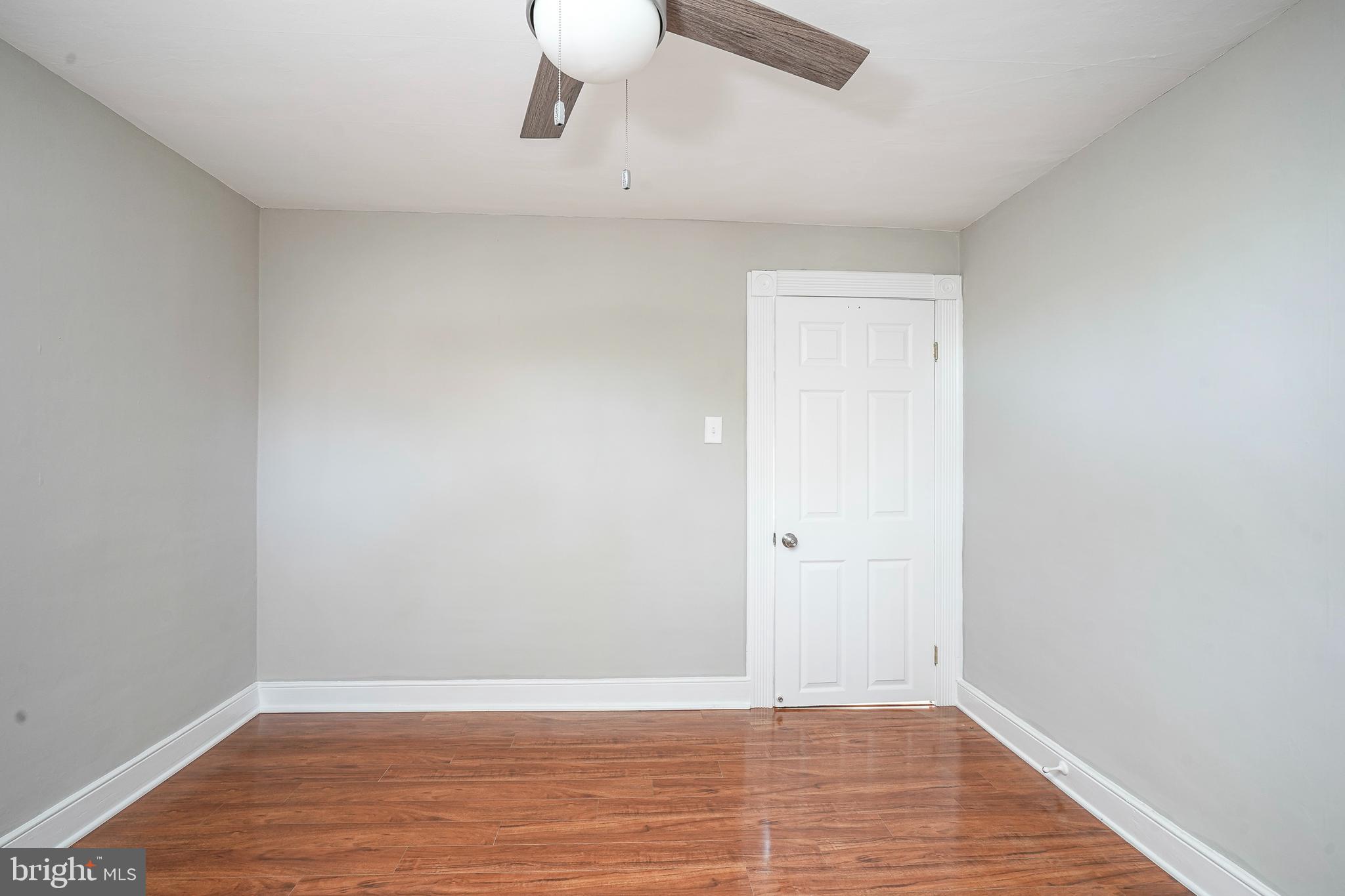 53 Branch Street Medford, NJ 08055 - Photo 33 of 41 a view of an empty room with wooden floor and a window