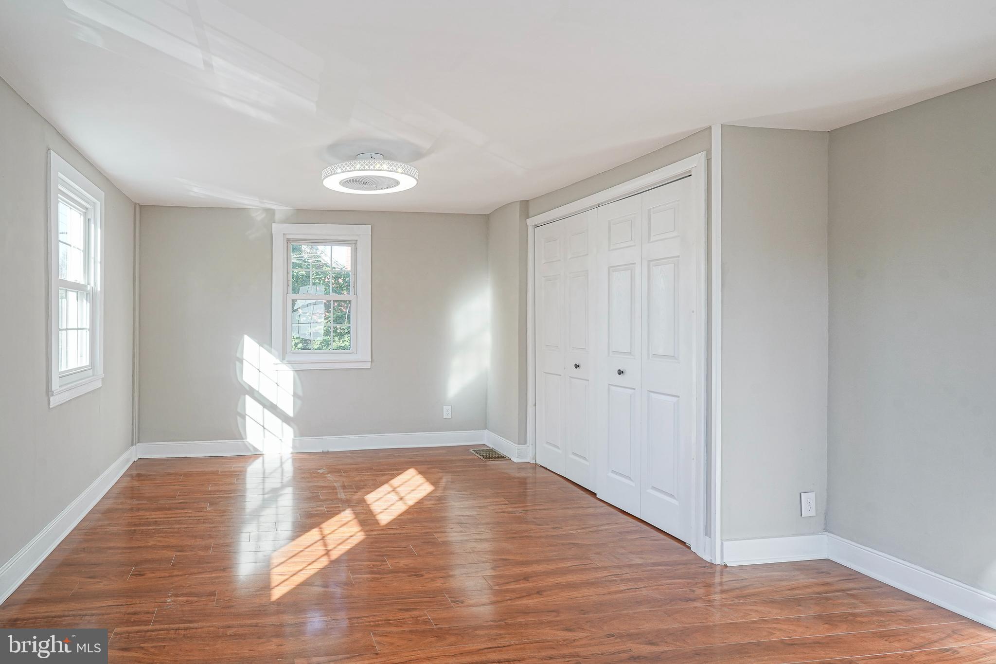 53 Branch Street Medford, NJ 08055 - Photo 34 of 41 a view of empty room with wooden floor and fan