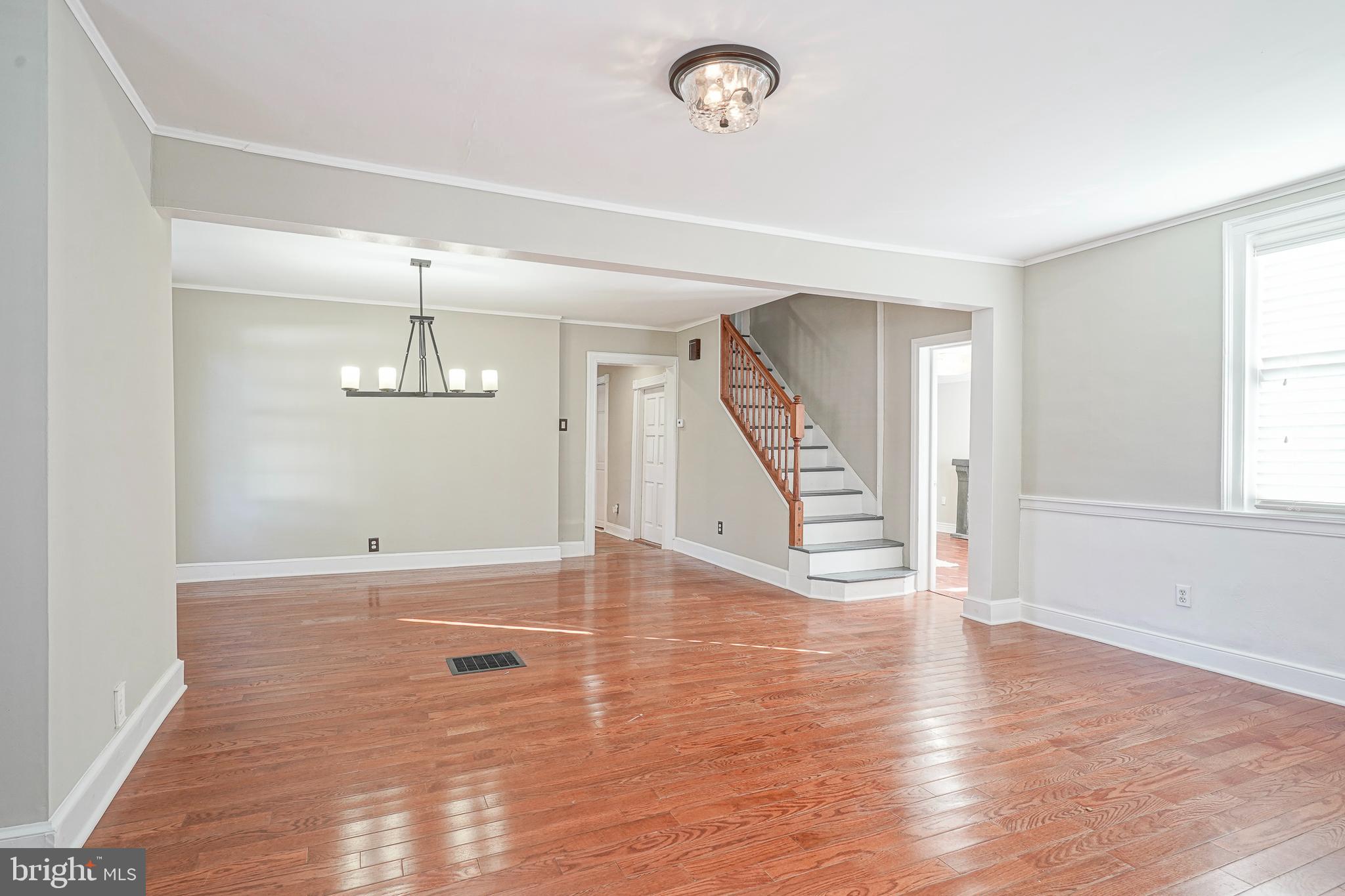 53 Branch Street Medford, NJ 08055 - Photo 8 of 41 a view of an empty room with wooden floor and window