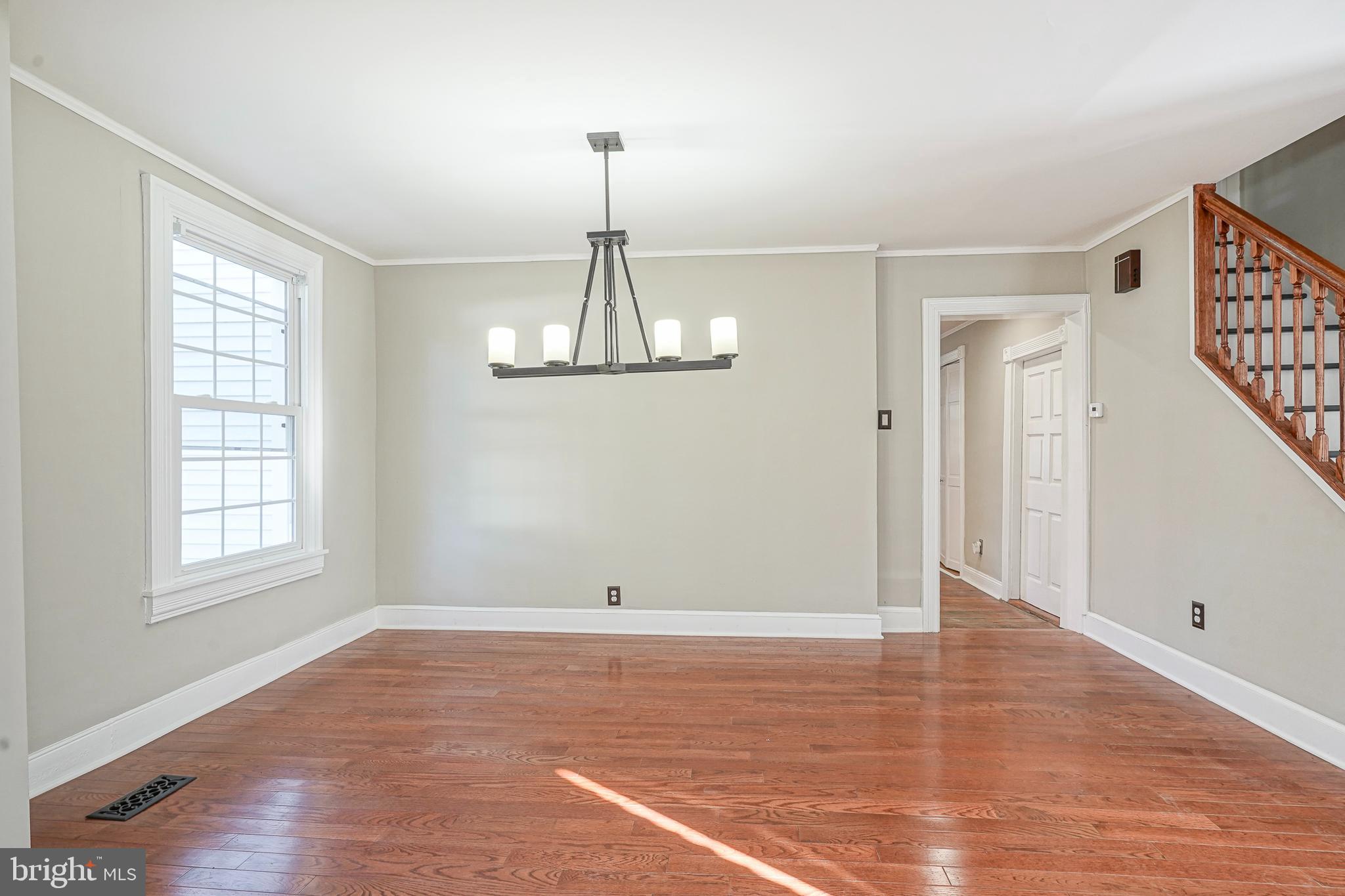 53 Branch Street Medford, NJ 08055 - Photo 9 of 41 a view of empty room with wooden floor and window